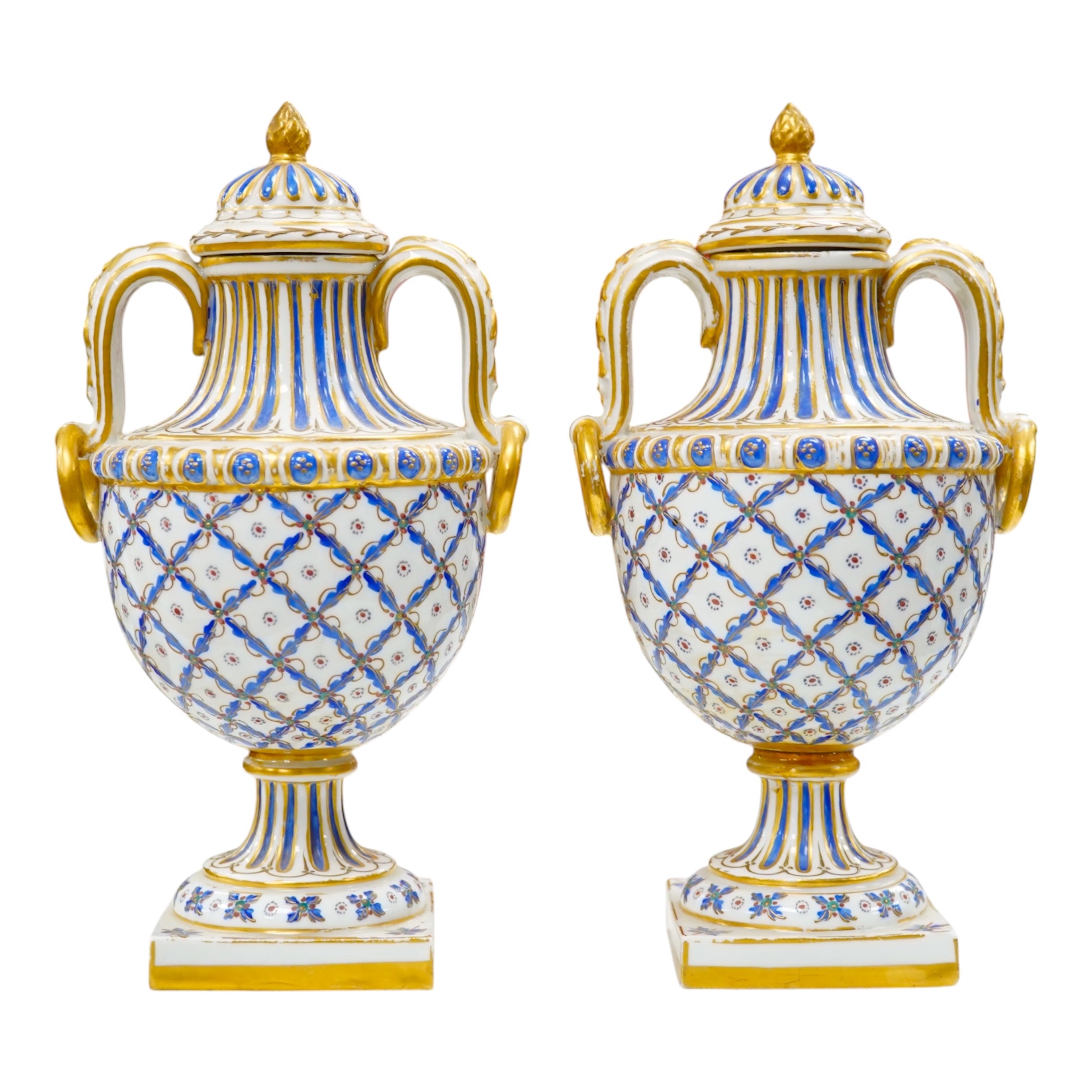 A pair of early 20th century Sevres style vases and covers, 21cm. Condition - good